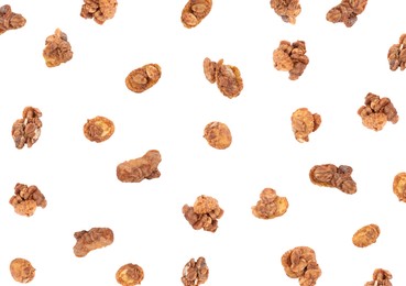 Image of Delicious granola falling on white background. Healthy snack  