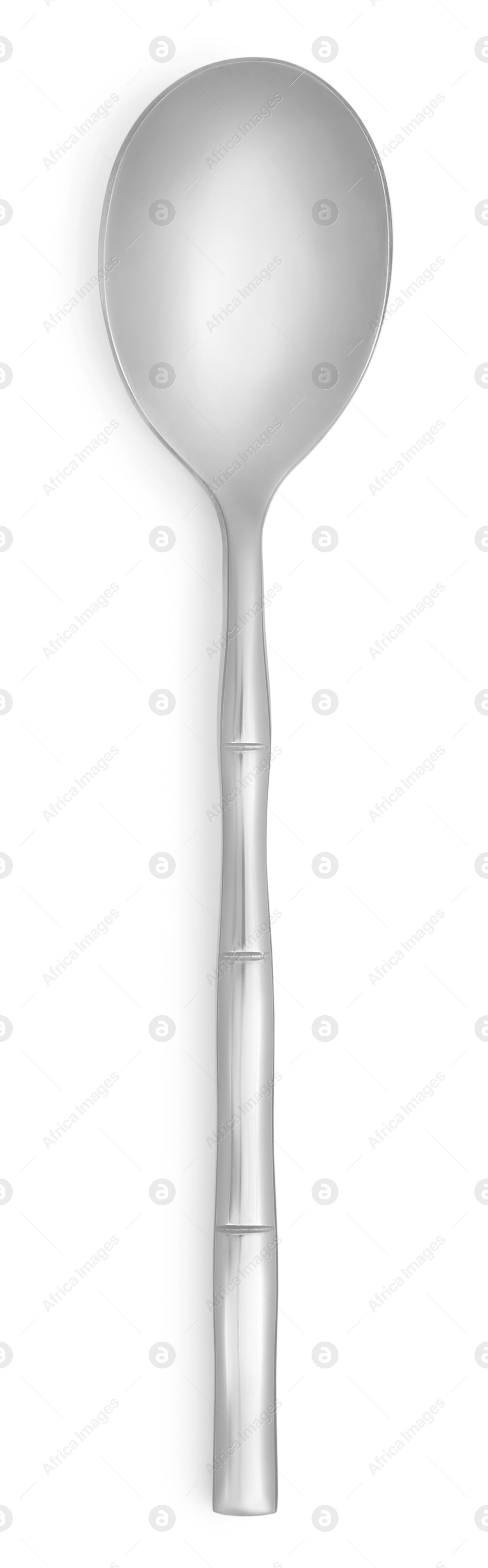 Photo of One new shiny tea spoon isolated on white, top view