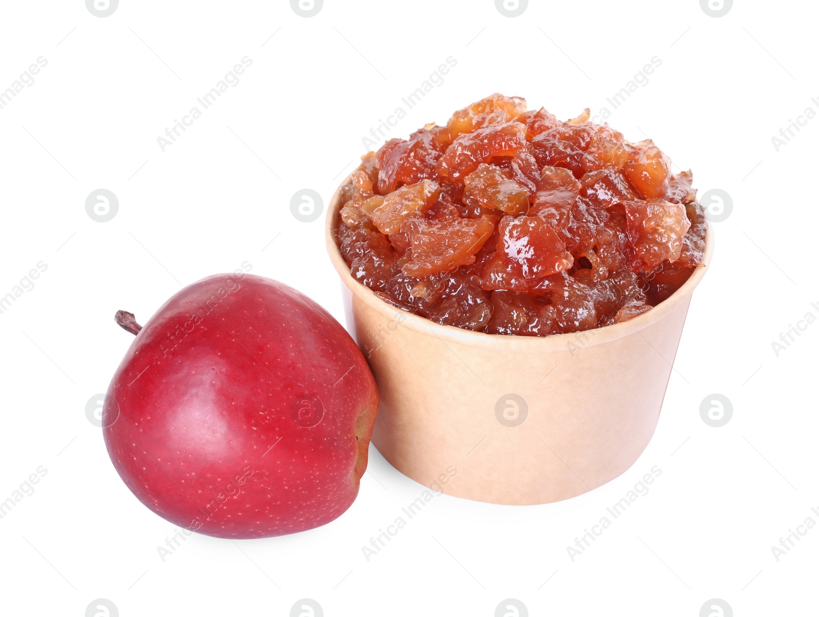 Photo of Delicious apple jam in paper cup and fresh fruit isolated on white