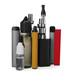 Photo of Many electronic smoking devices and liquid solutions on white background