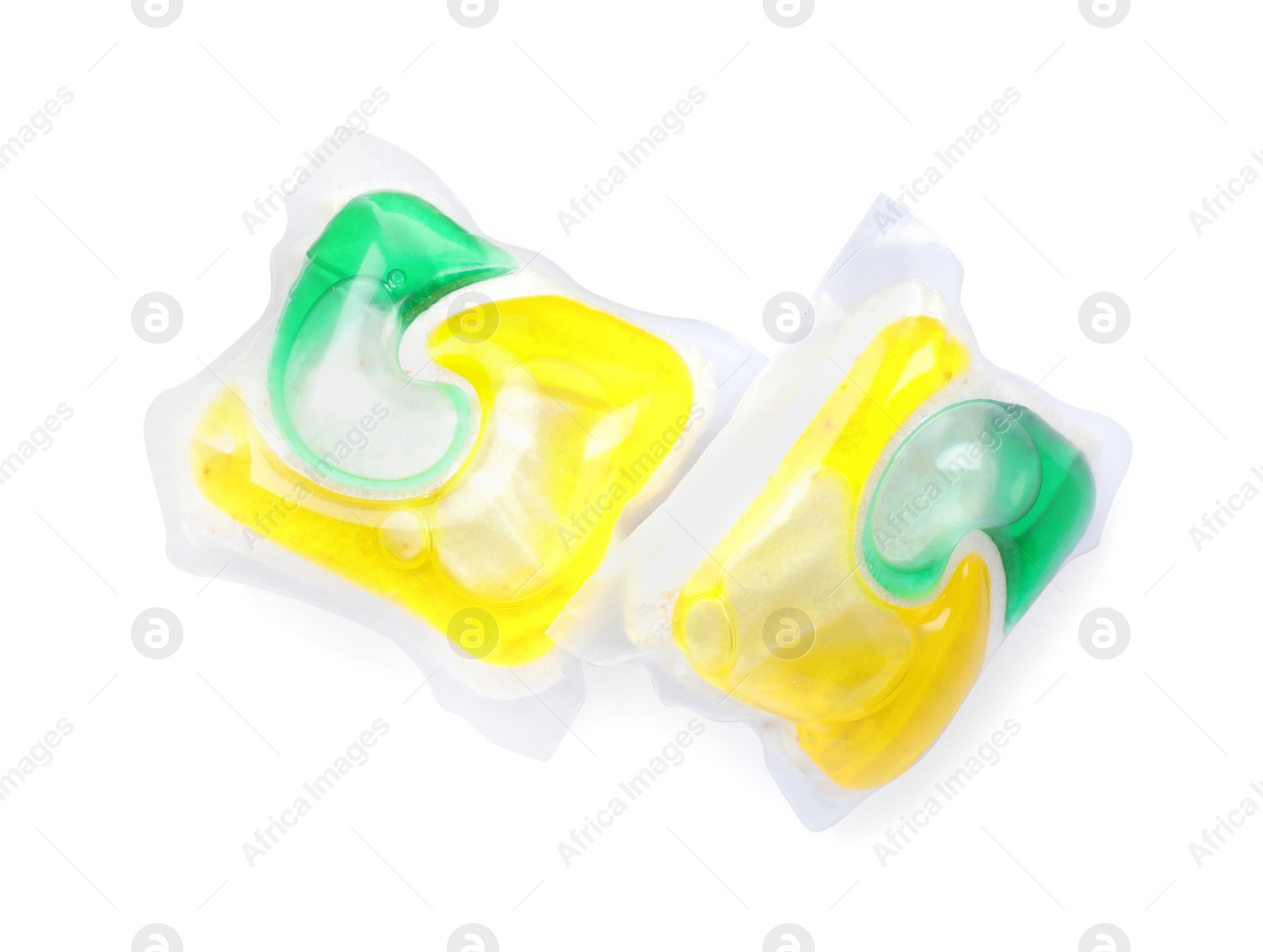 Photo of Two dishwasher detergent pods on white background, top view