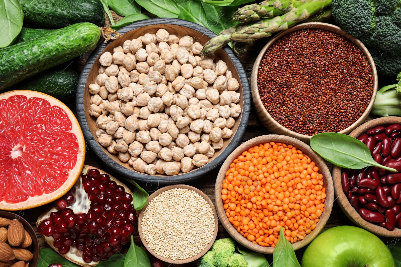 Photo of Fresh vegetables, fruits and seeds on table, flat lay