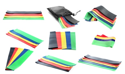 Image of Set of different fitness elastic bands on white background 