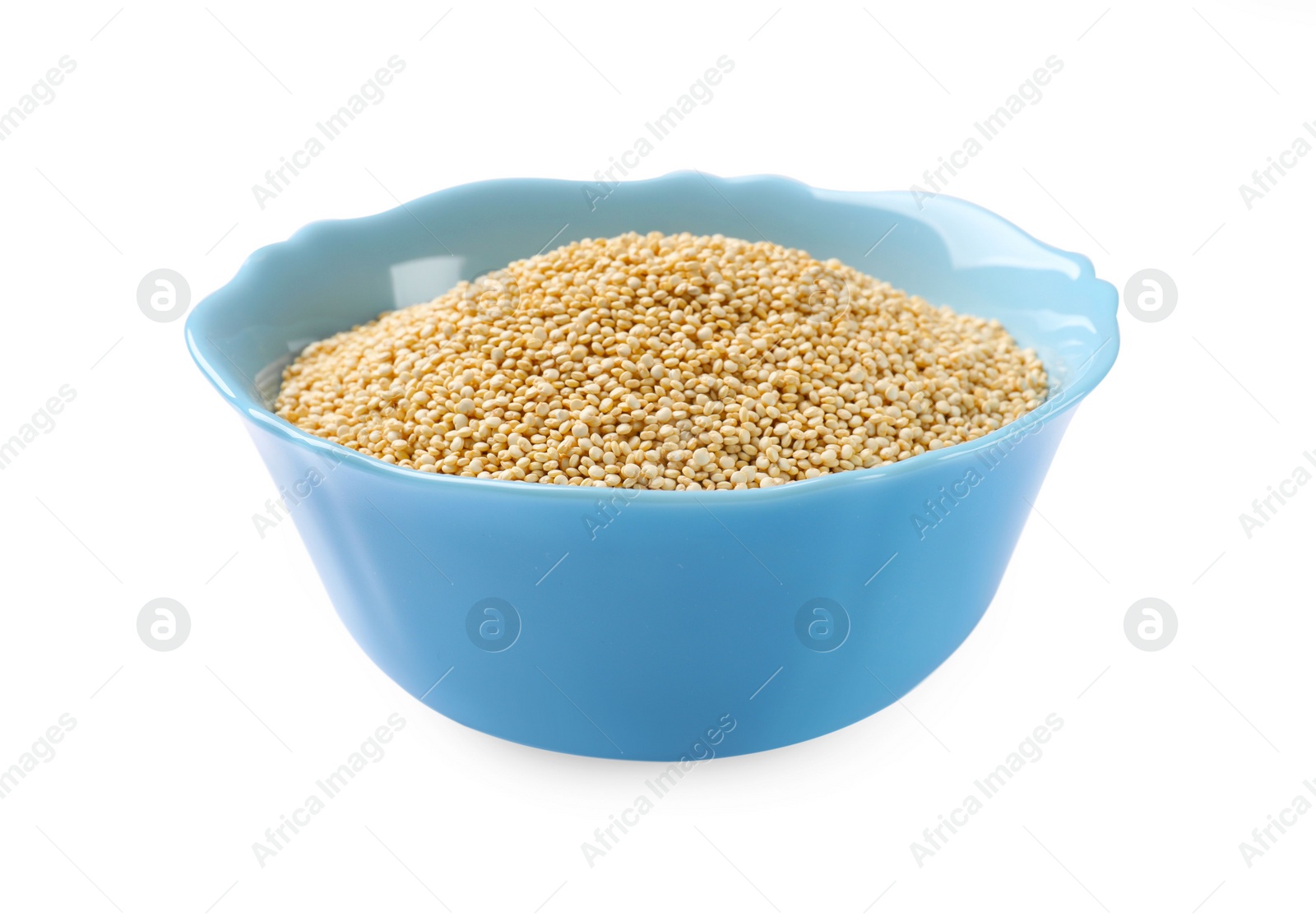 Photo of Raw quinoa in light blue bowl isolated on white