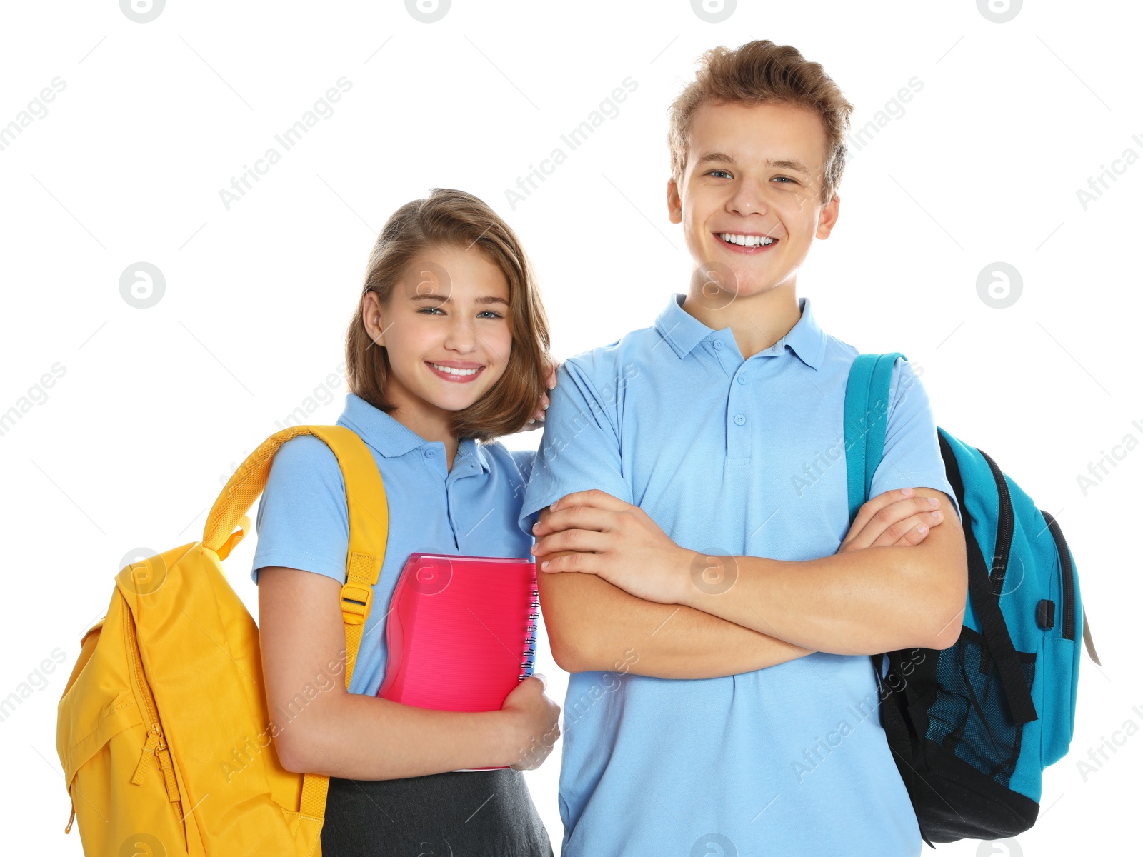 Photo of Happy pupils in school uniform on white background