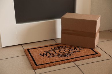 Photo of Parcel delivered on mat near front door