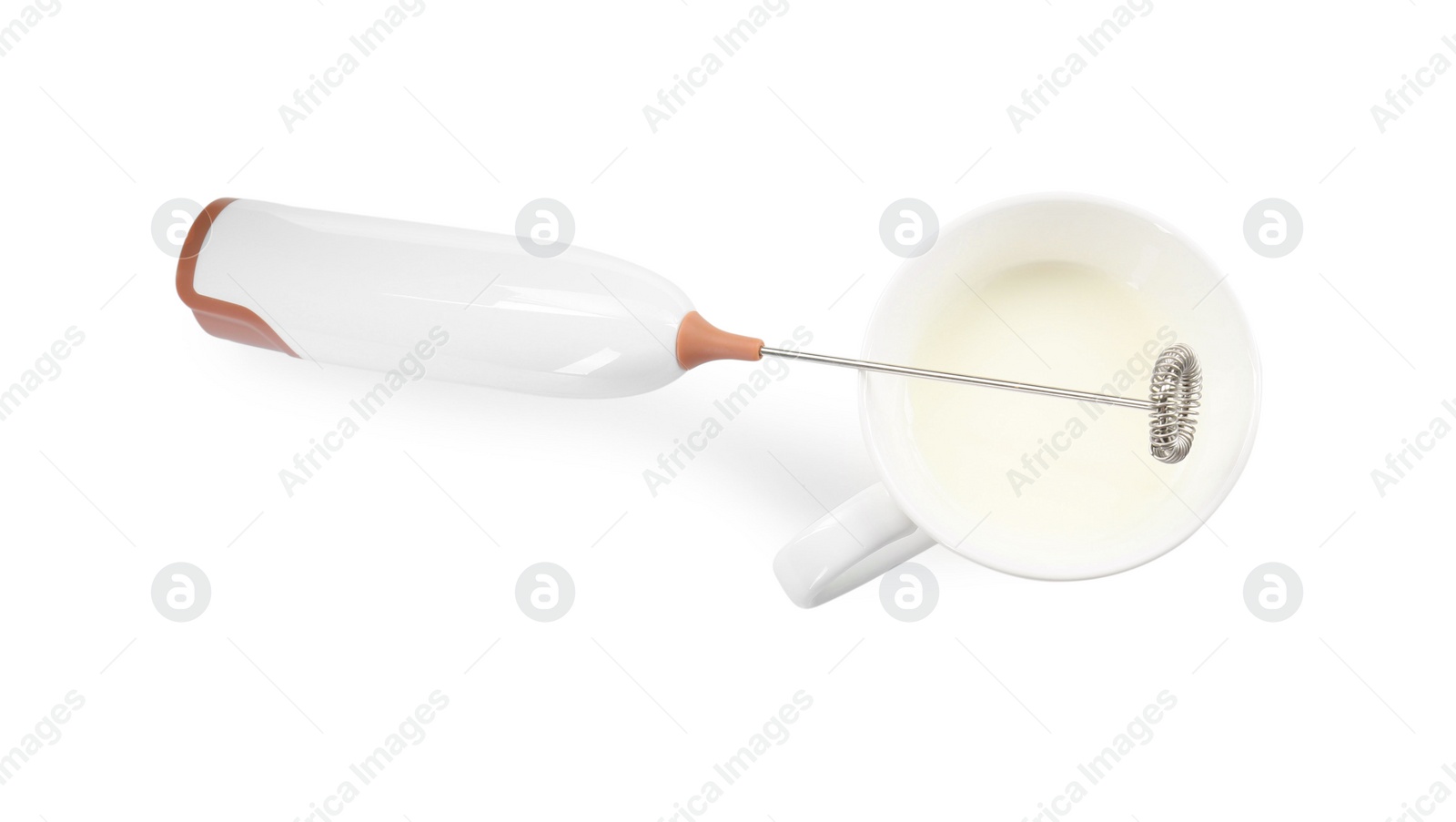 Photo of Milk frother wand and cup isolated on white, top view