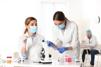 Scientists working in laboratory. Research and analysis