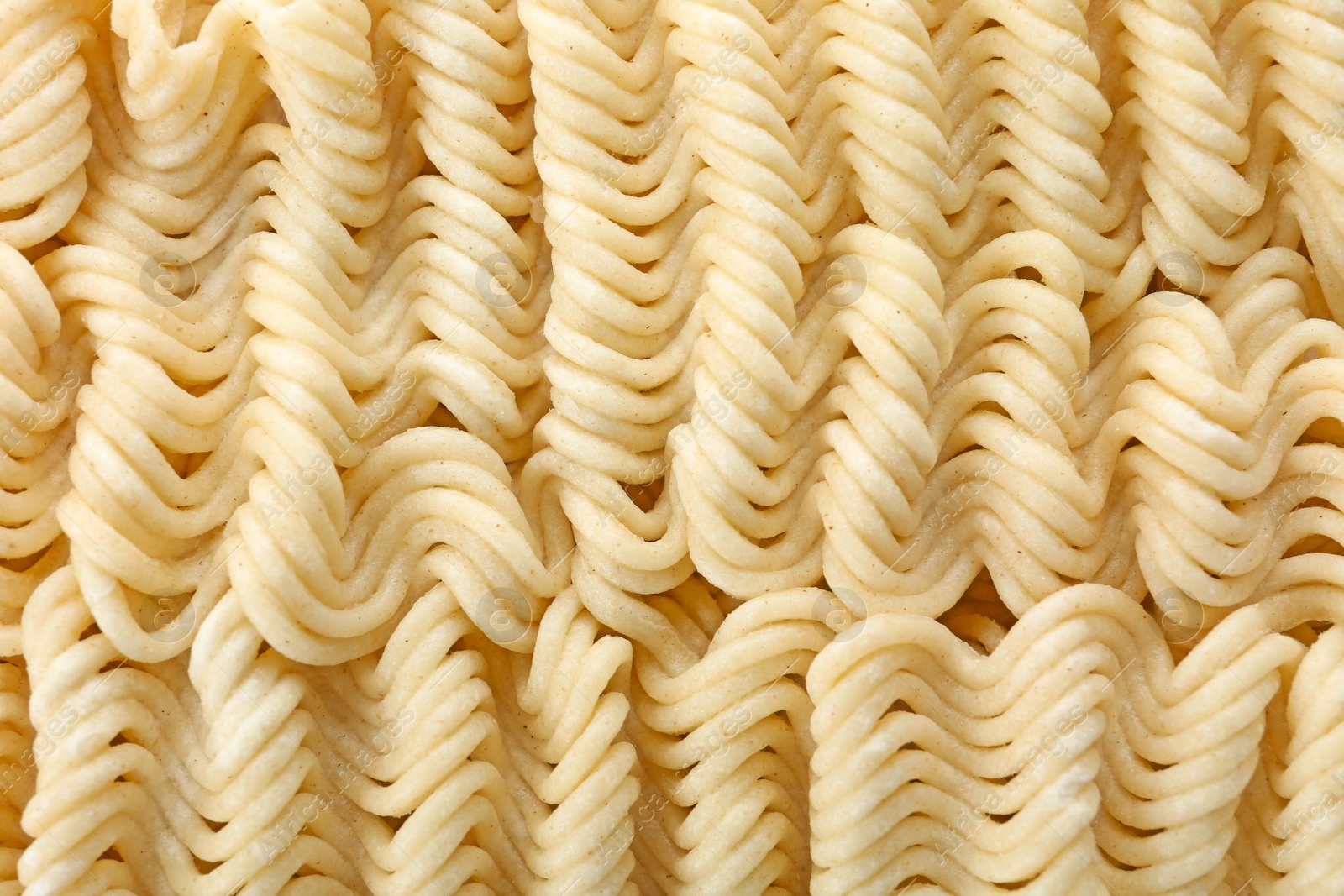 Photo of Quick cooking noodles as background, closeup view