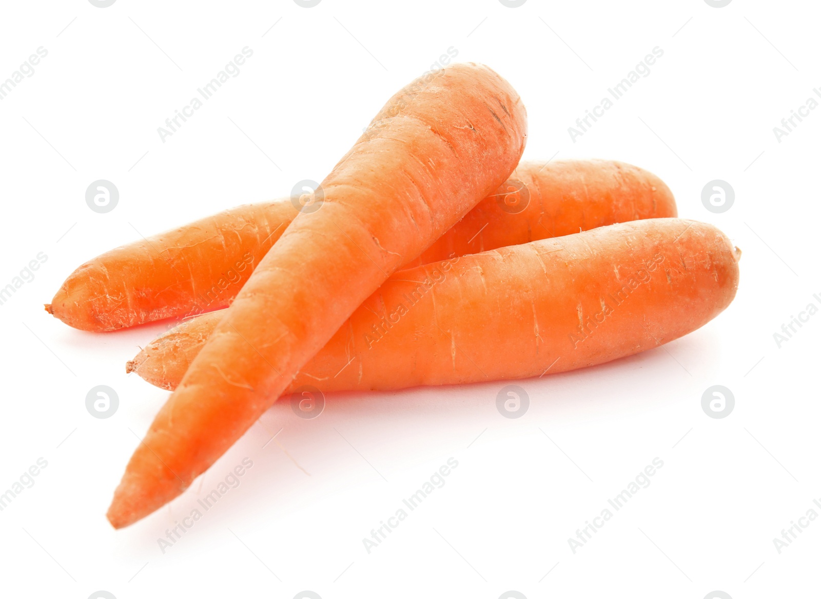 Photo of Ripe fresh carrots on white background