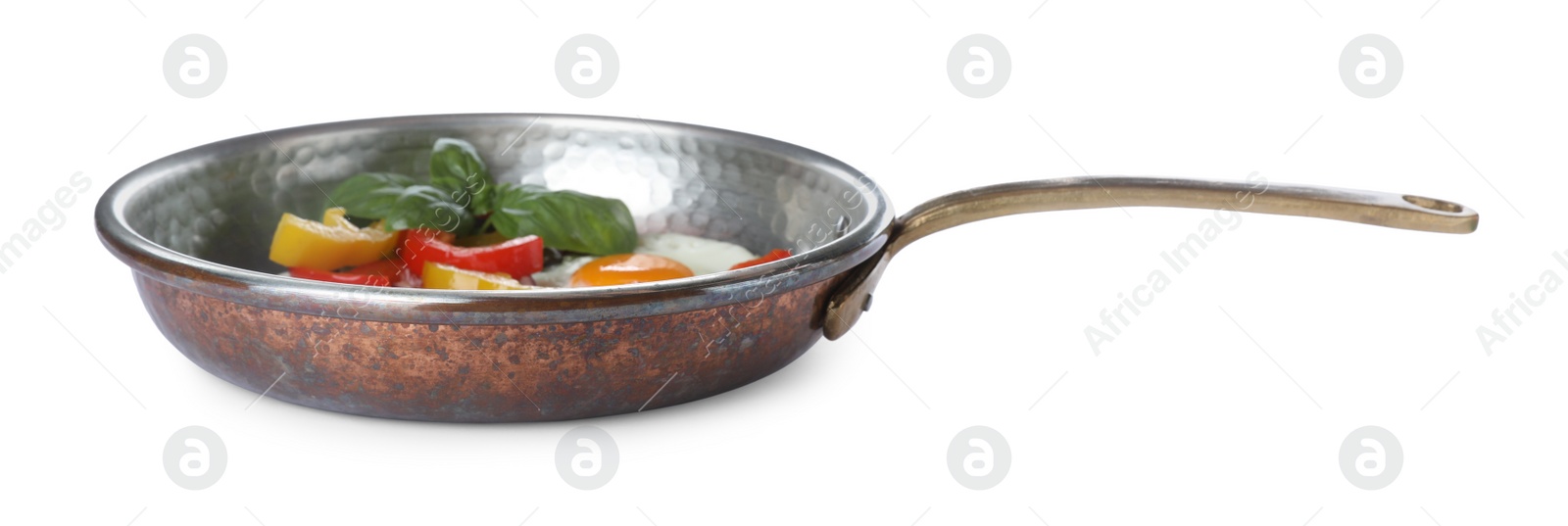 Photo of Tasty fried egg with vegetables in pan isolated on white