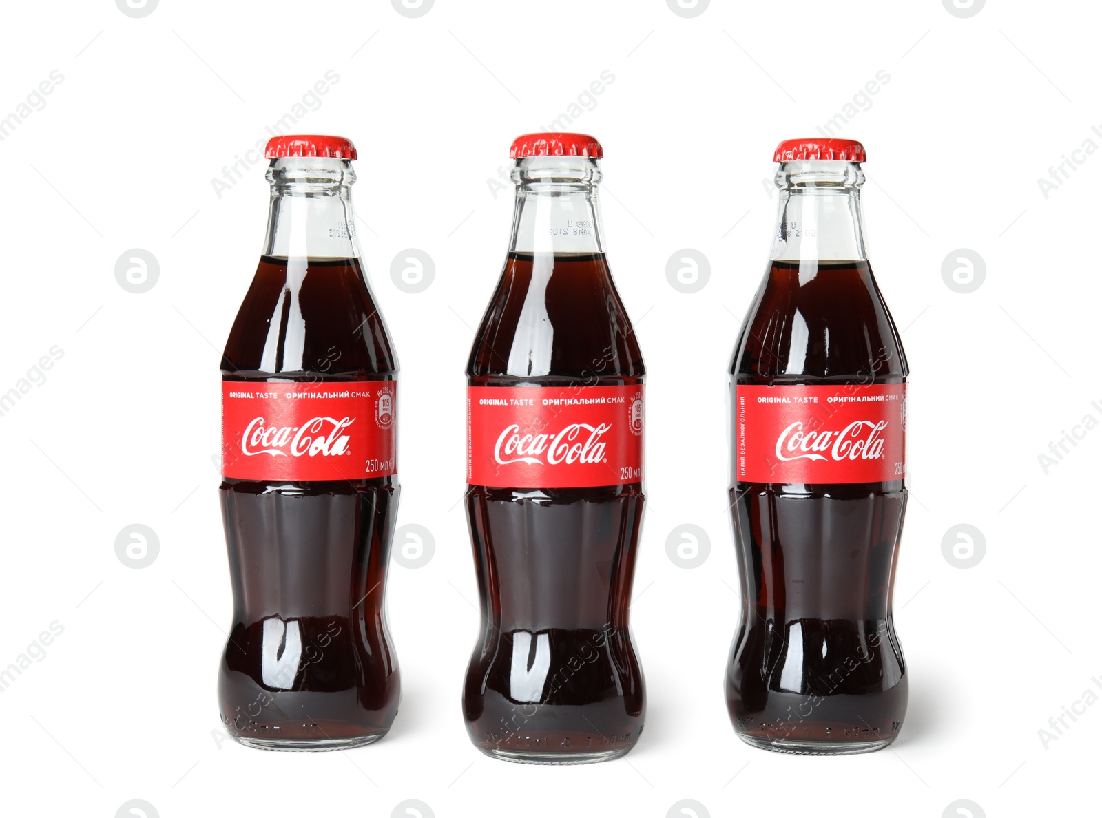 Photo of MYKOLAIV, UKRAINE - NOVEMBER 14, 2018: Bottles of Coca-Cola on white background