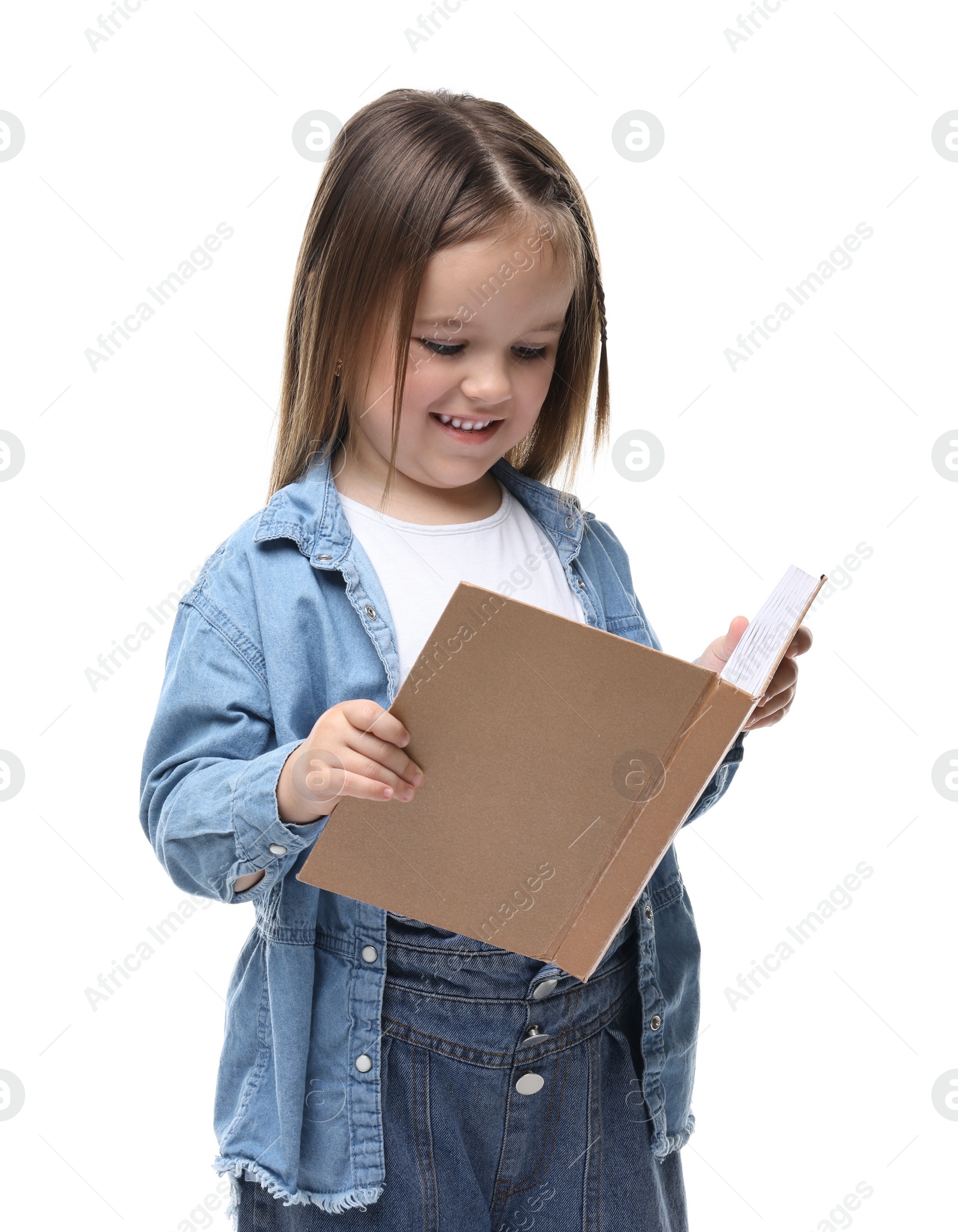 Photo of Cute little girl reading book on white background