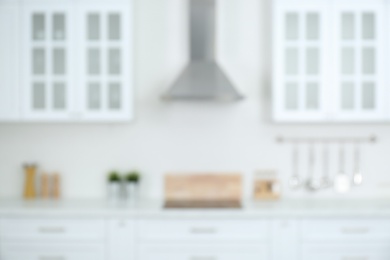 Photo of Blurred view of modern stylish kitchen interior