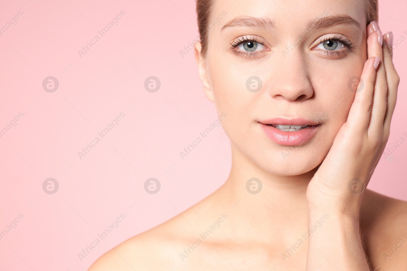 Photo of Portrait of beautiful young woman and space for text on color background. Cosmetic surgery concept