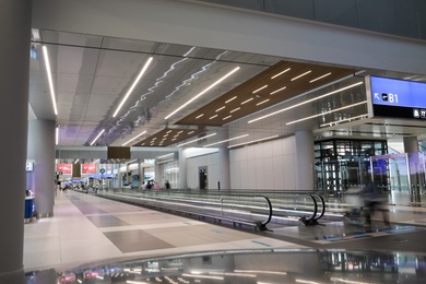 Photo of ISTANBUL, TURKEY - AUGUST 13, 2019: Interior of new airport terminal with moving walkway