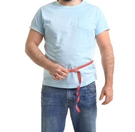 Photo of Overweight man with measuring tape on white background