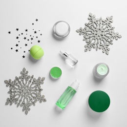 Set of cosmetic products on white background, flat lay. Winter care