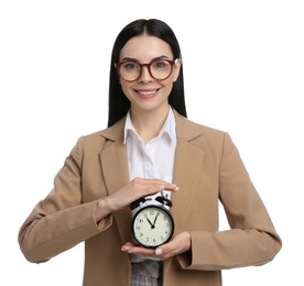 Photo of Businesswoman holding alarm clock on white background. Time management