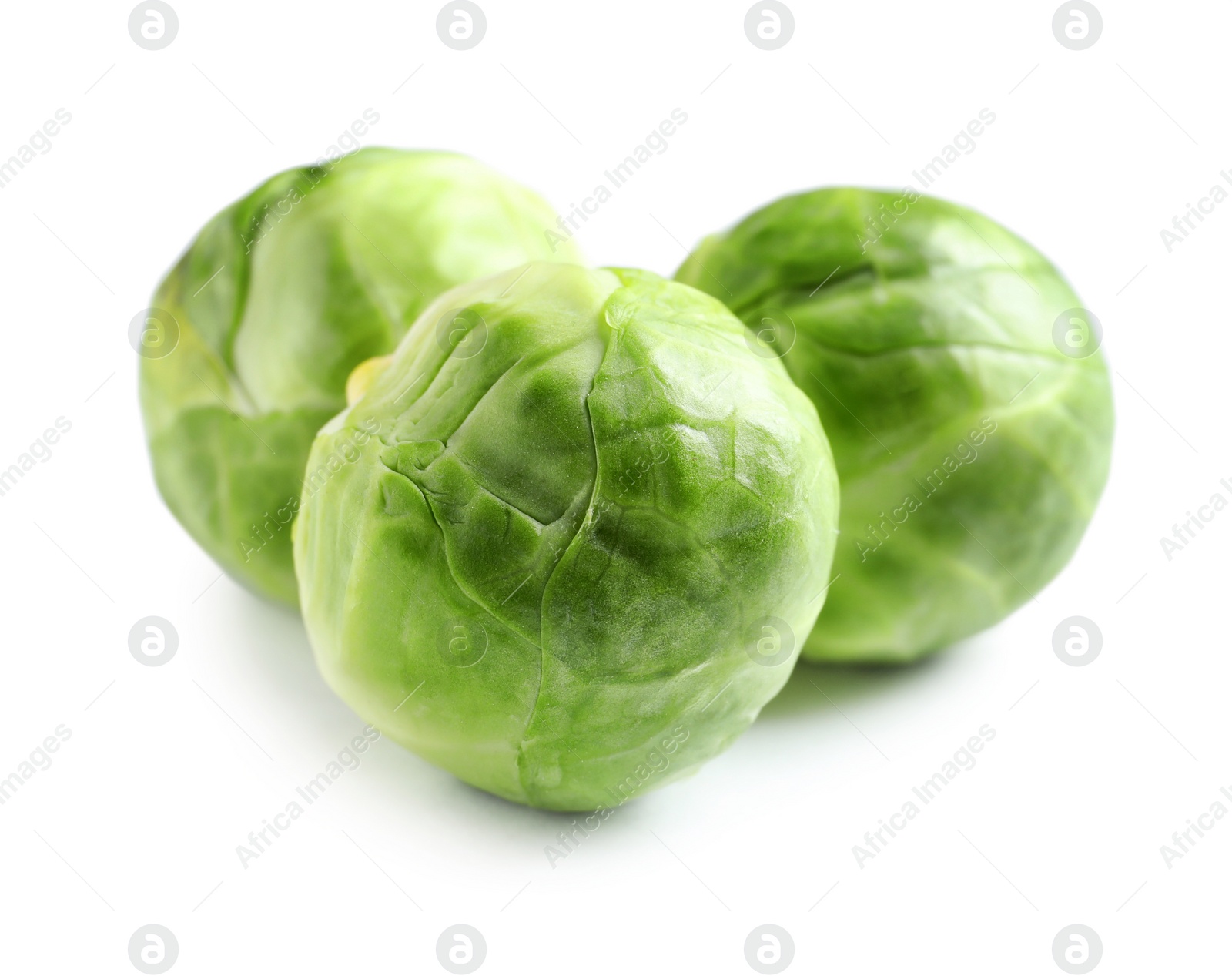 Photo of Fresh tasty Brussels sprouts on white background