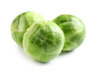 Photo of Fresh tasty Brussels sprouts on white background