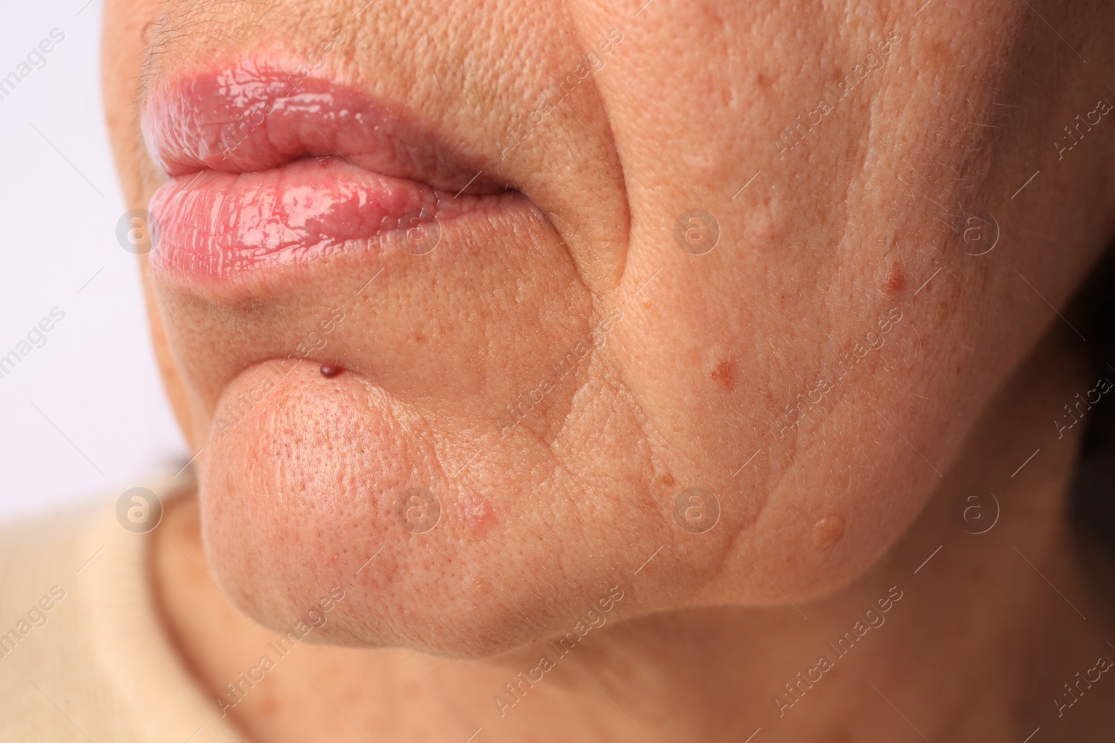 Photo of Skin care. Senior woman, closeup view of lips