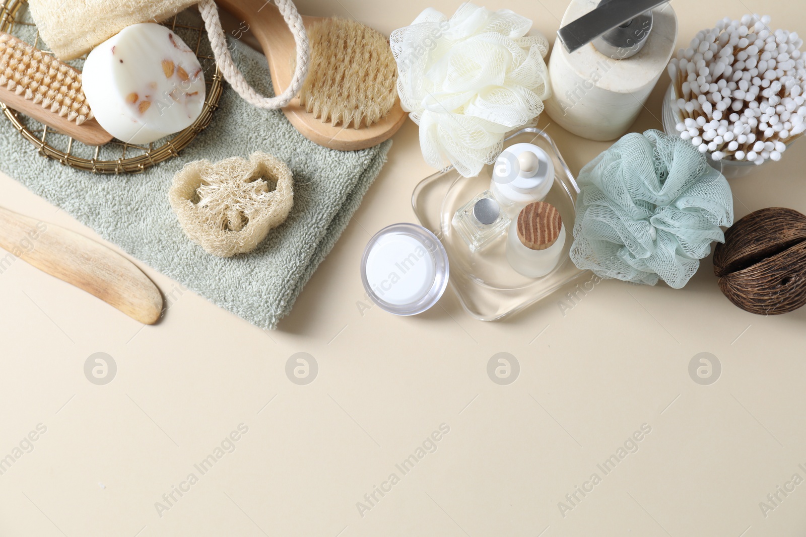 Photo of Bath accessories. Flat lay composition with personal care products on beige background, space for text