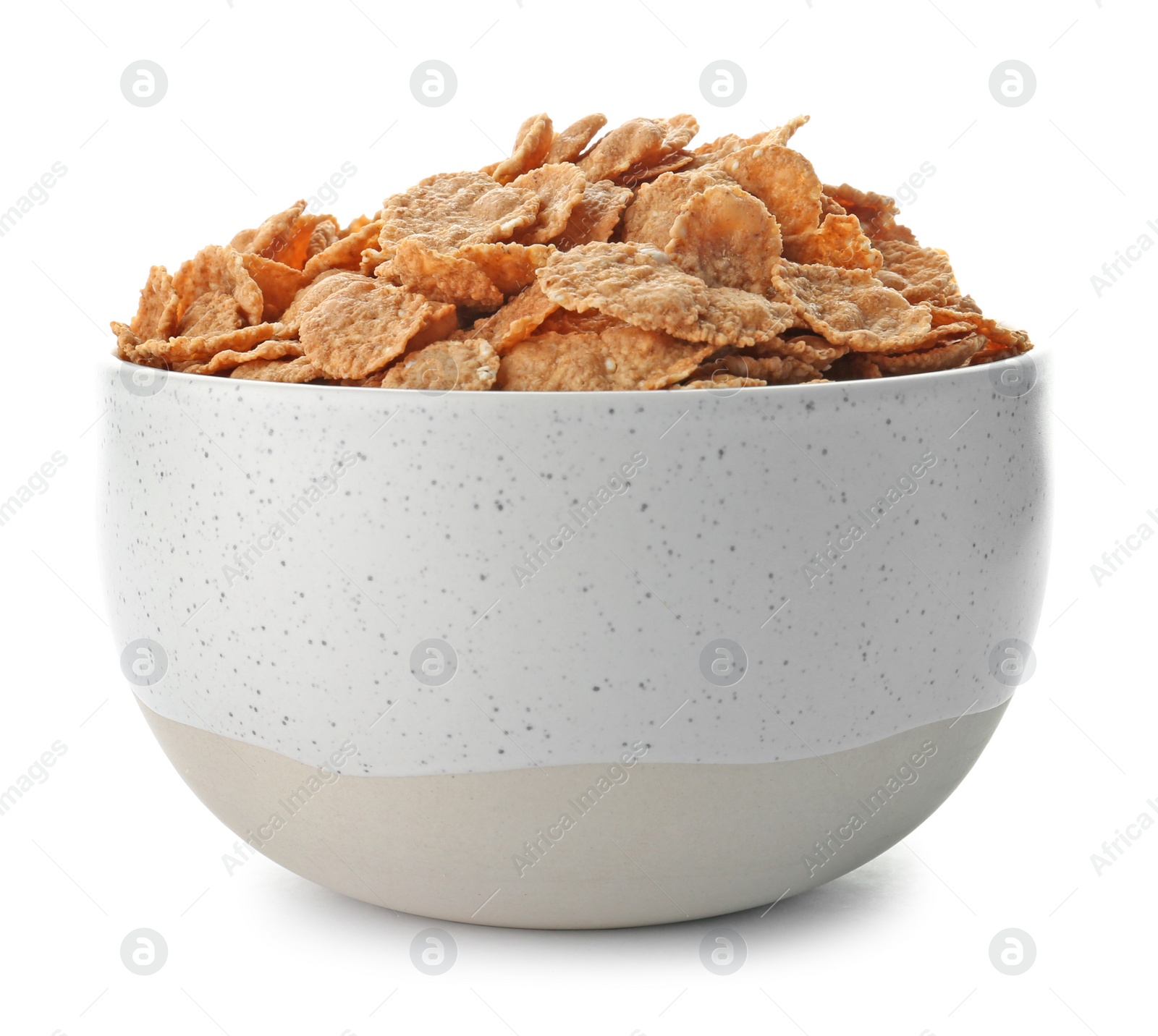 Photo of Bowl with wheat flakes on white background. Healthy grains and cereals