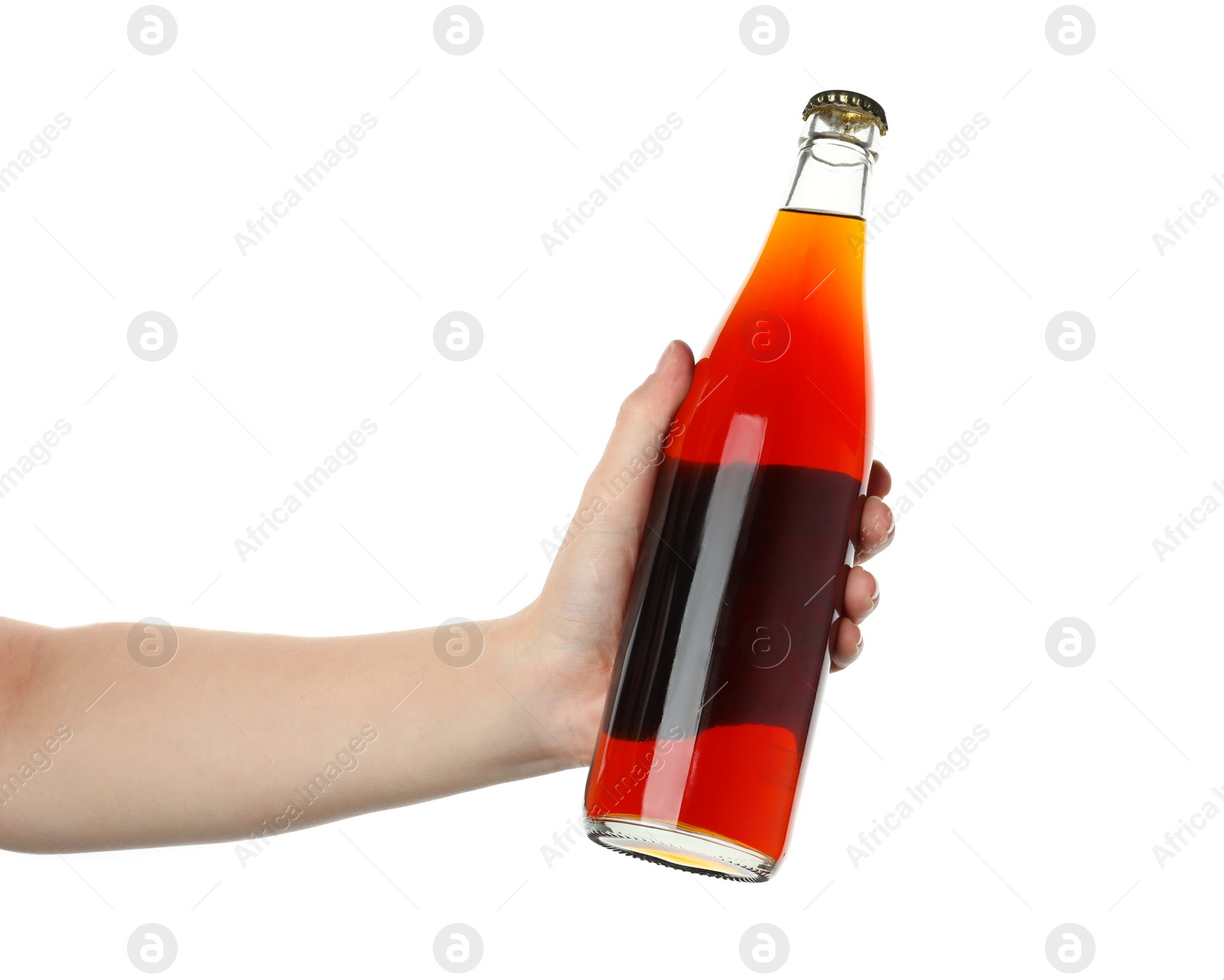 Photo of Woman holding bottle of delicious kvass on white background, closeup