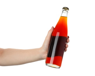 Woman holding bottle of delicious kvass on white background, closeup