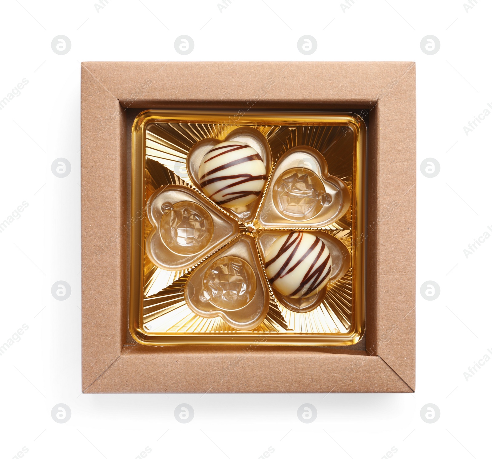 Photo of Partially empty box of chocolate candies isolated on white, top view