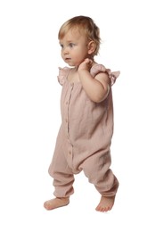 Photo of Cute baby girl learning to walk on white background