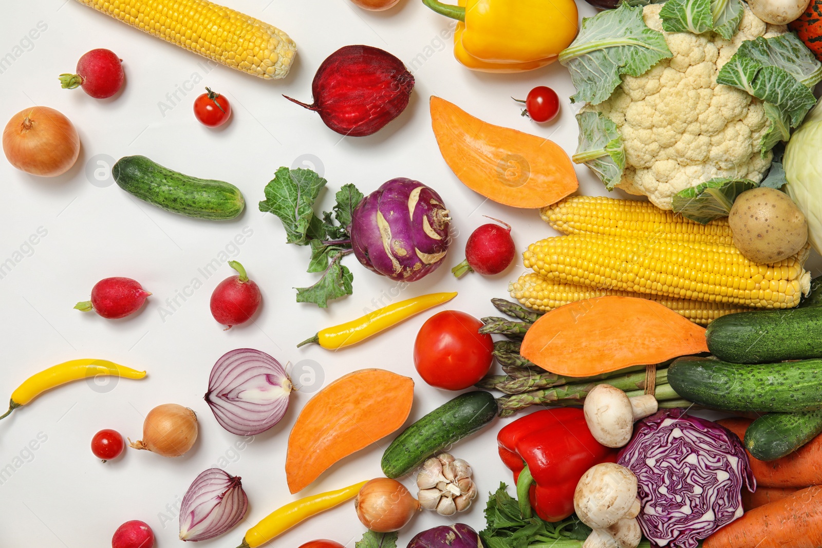 Photo of Flat lay composition with fresh vegetables on white background