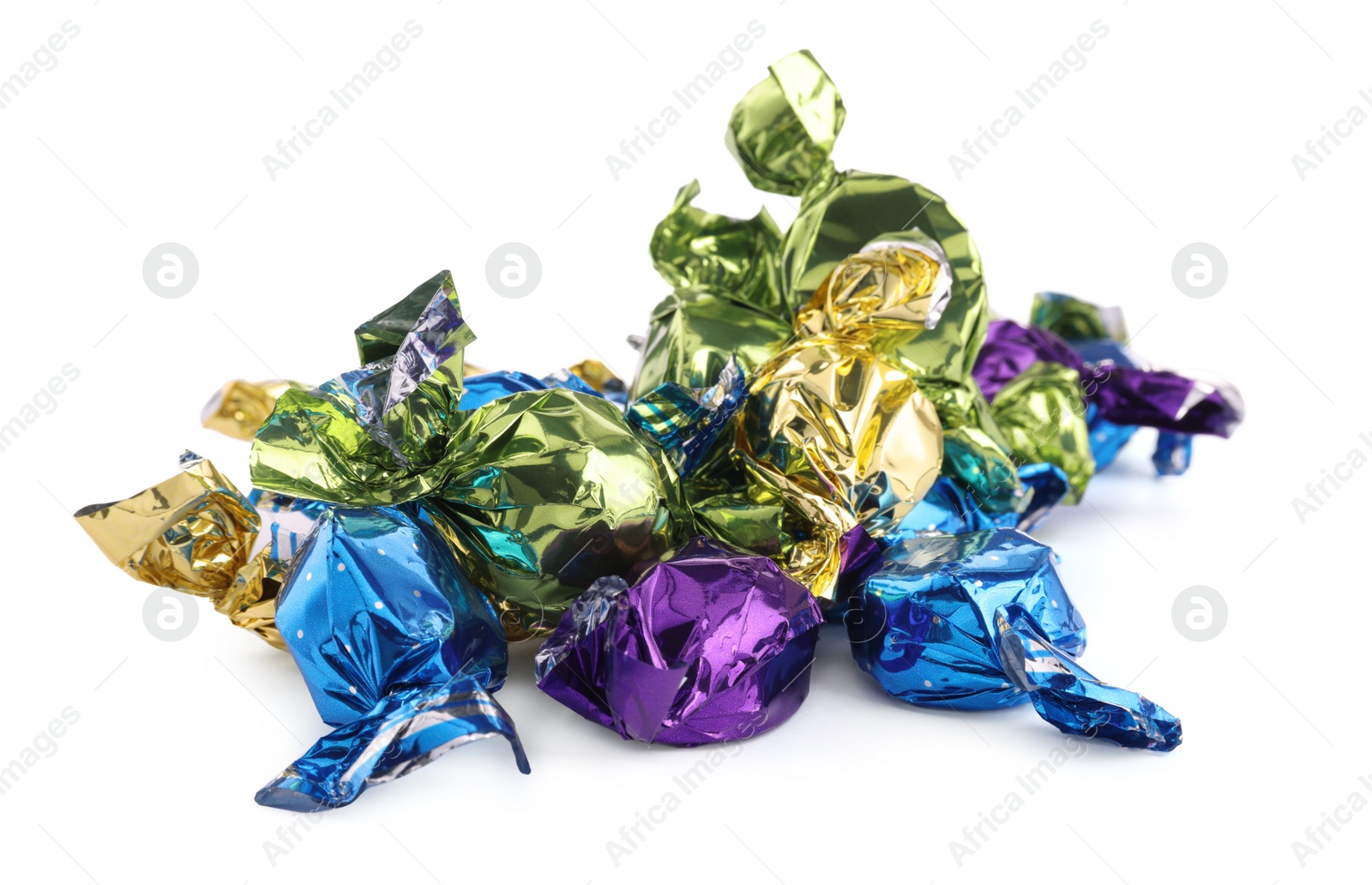 Photo of Candies in colorful wrappers isolated on white