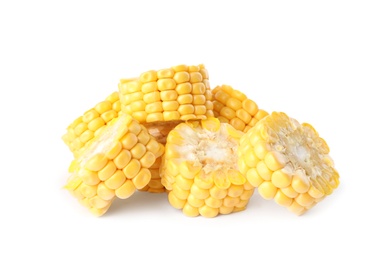 Photo of Pieces of ripe raw corn cob on white background