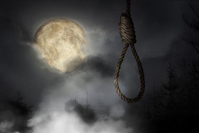 Image of Rope noose with knot outdoors on full moon night