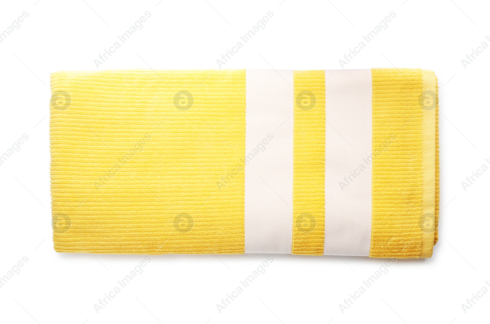 Photo of Folded yellow towel isolated on white, top view. Beach object