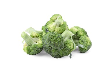 Photo of Pile of fresh raw green broccoli isolated on white