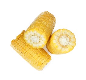 Photo of Pieces of corncobs on white background, top view