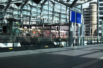 Photo of Modern railway station with platforms under overhang