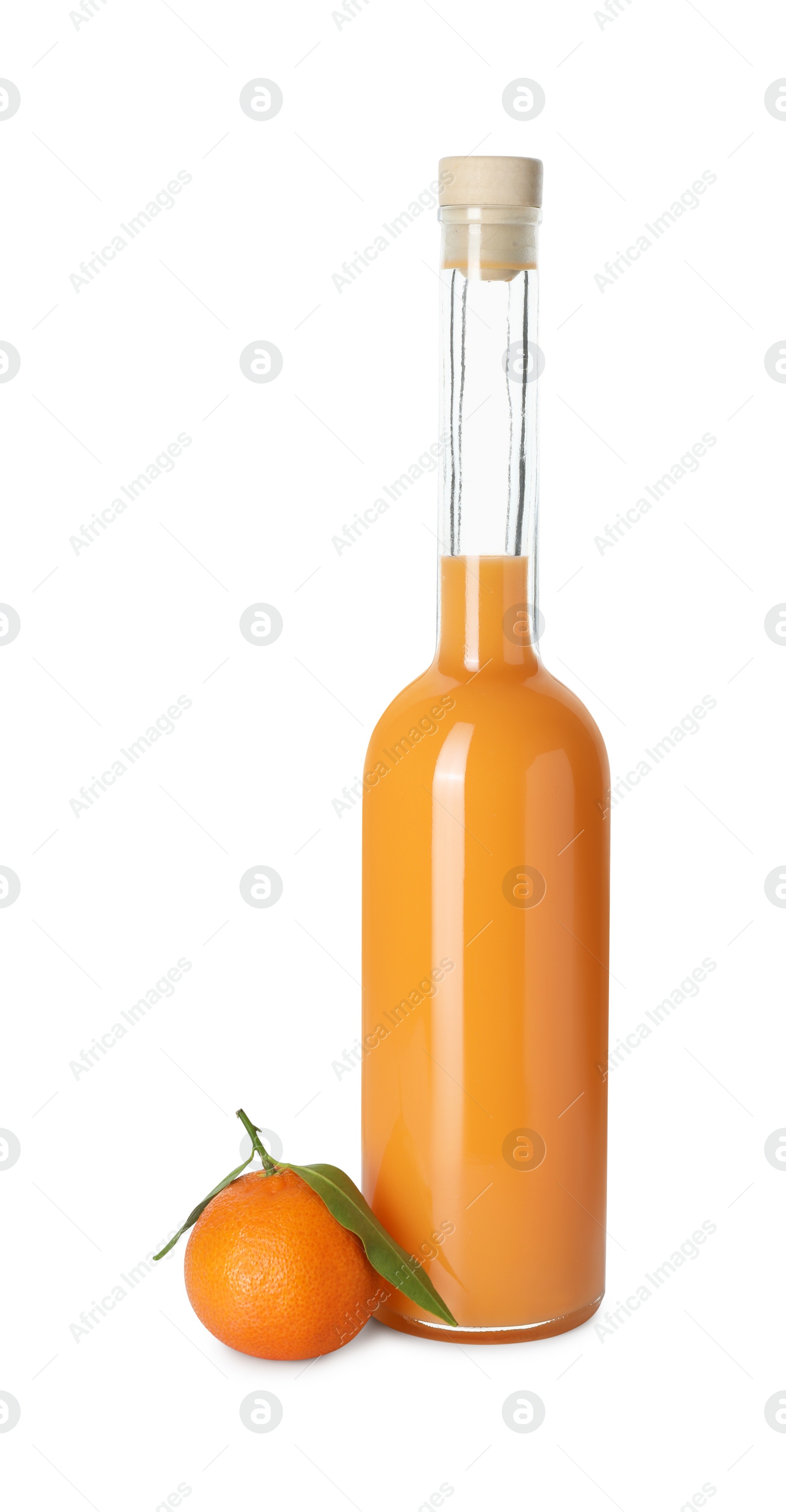 Photo of Bottle of tasty tangerine liqueur and fresh fruit isolated on white