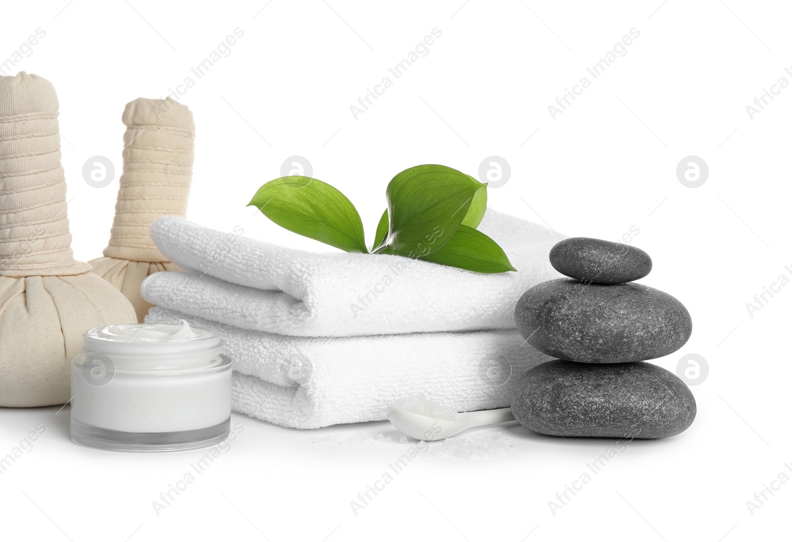 Photo of Beautiful composition with spa stones on white background