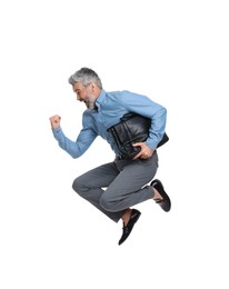 Photo of Mature businessman in stylish clothes with briefcase jumping on white background