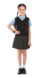 Photo of Full length portrait of cute girl in school uniform on white background