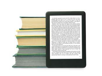 Image of Portable e-book and stack of hardcover books on white background