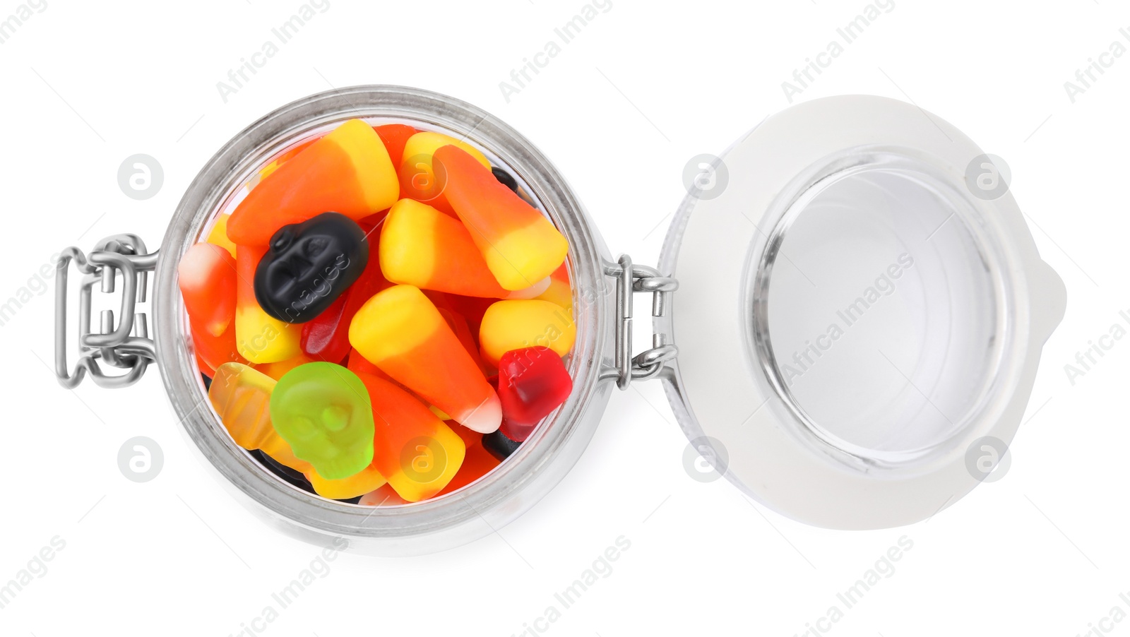 Photo of Jar of delicious colorful candies isolated on white, top view. Halloween sweets