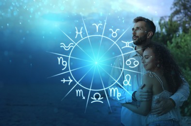 Image of Horoscope compatibility. Loving couple and zodiac wheel