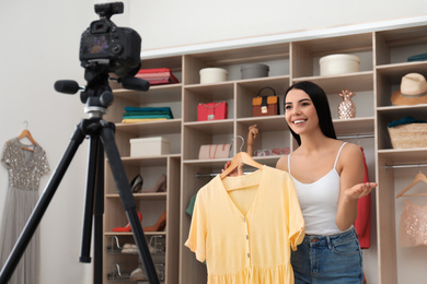 Fashion blogger recording new video in room