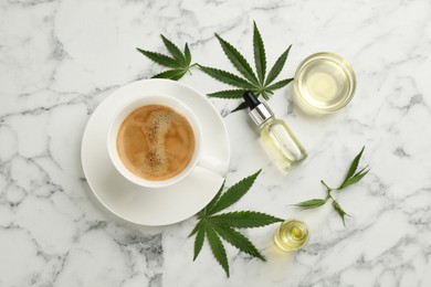 CBD oil, THC tincture, cup of coffee and hemp leaves on white marble table, flat lay