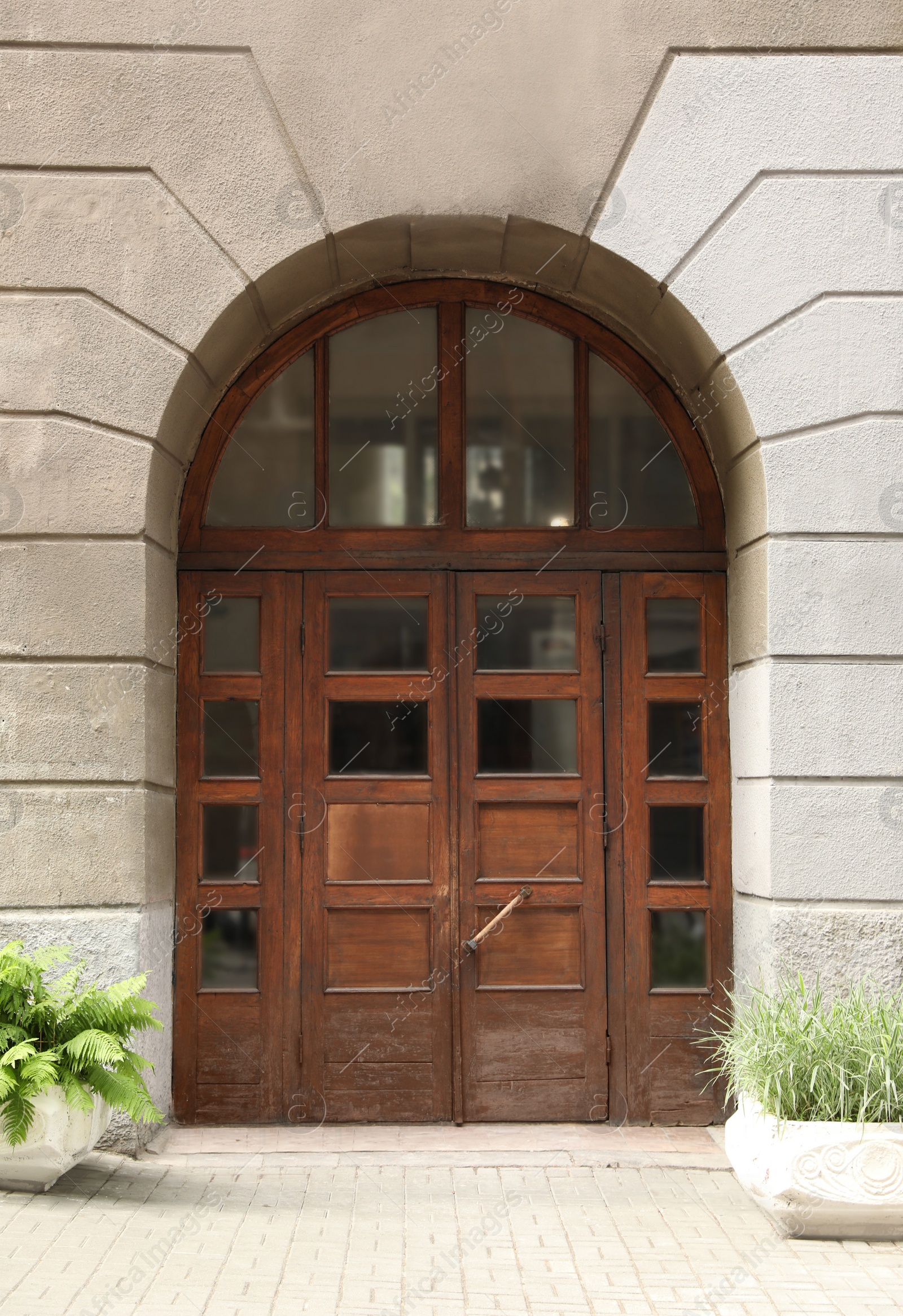 Photo of Building with vintage wooden door. Exterior design